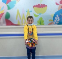 Ezzeldin Returns with Sweets for the Department after Successful Treatment