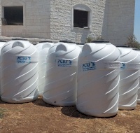 PCRF Distributes Water Barrels to Families in Jenin