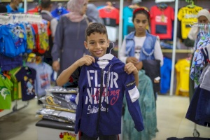 PCRF Distributes Clothes for Gaza Children before Eid
