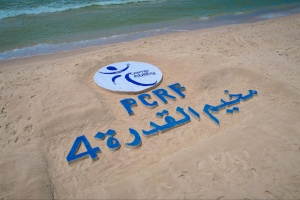 Artistic Unity on Gaza's Shore: Amputees Create Emblem of Connection at Camp Ability