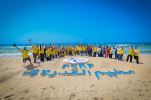 Artistic Unity on Gaza's Shore: Amputees Create Emblem of Connection at Camp Ability