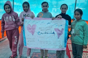Children Celebrate Completing an Expressive Artwork in a Shelter, Gaza