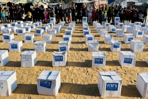 Zeit Wa Zaatar Parcels at a Shelter in Southern Gaza