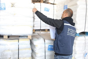 PCRF Team Preparing Thousands of Flour Sacks for Distribution