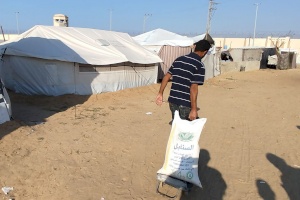 Father Receiving Flour to Feed His Family in Gaza