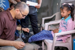 Humanitarian Distribution of Orthopedic Shoes for Gazan Children