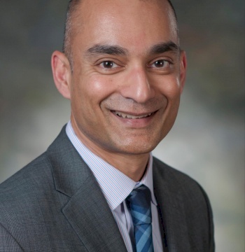 Dr. Adil Husain