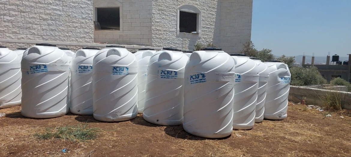 PCRF Distributes Water Barrels to Families in Jenin