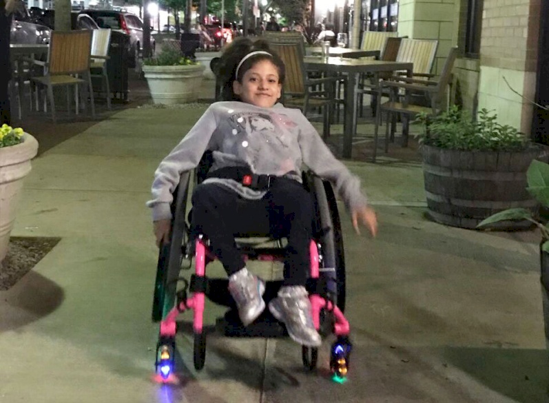 Dallas Community Provides Paralyzed Child Wheelchair